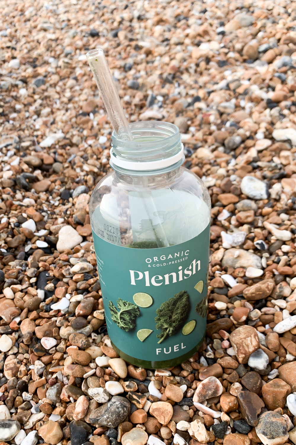 Plenish Fuel juice on beach