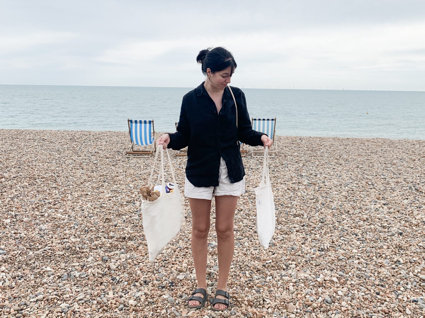 Besma doing a beach clean on Brighton beach