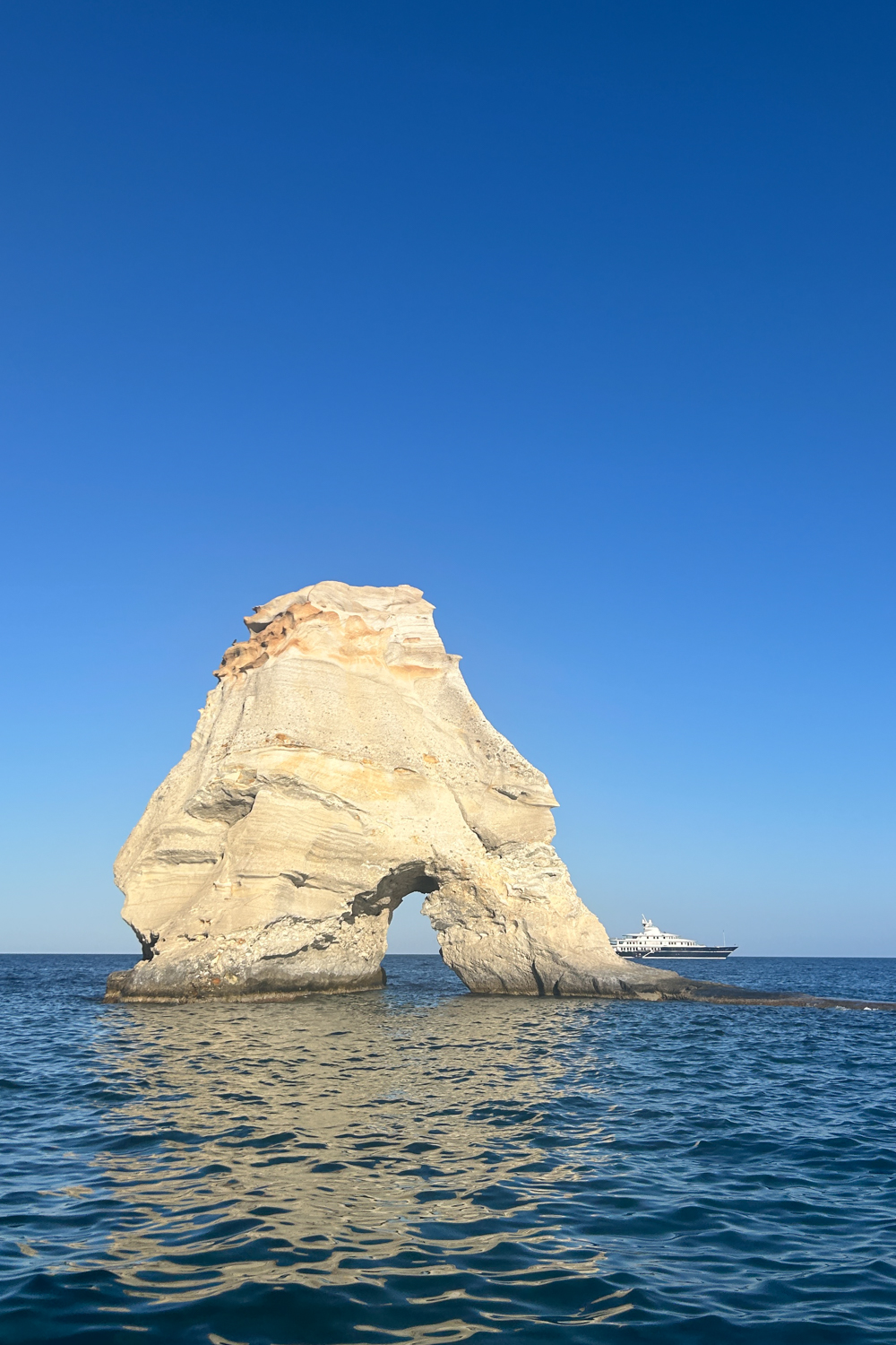 Rock formation in the water island hopping in the Cyclades