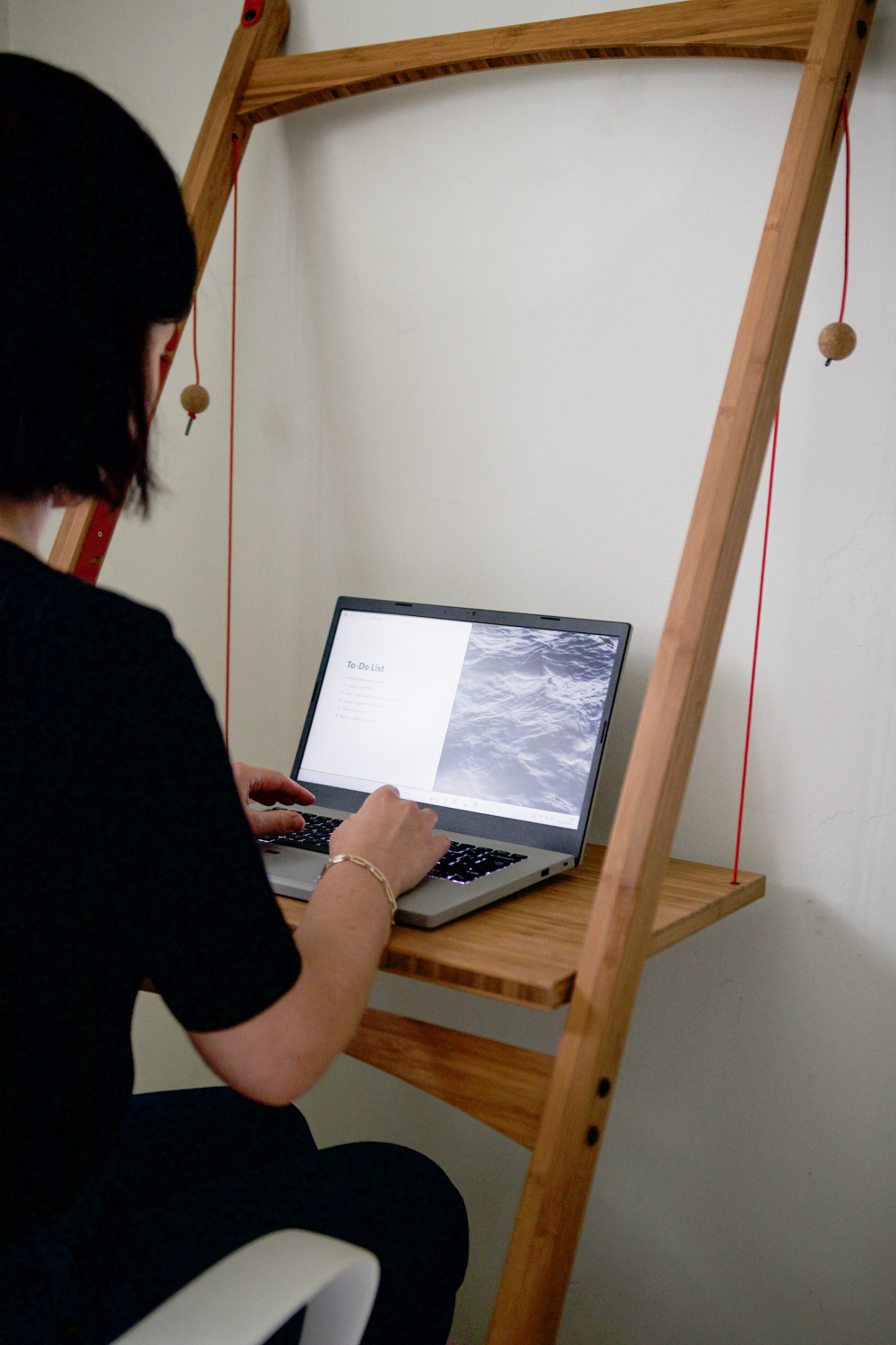 Besma sitting at Leandesk