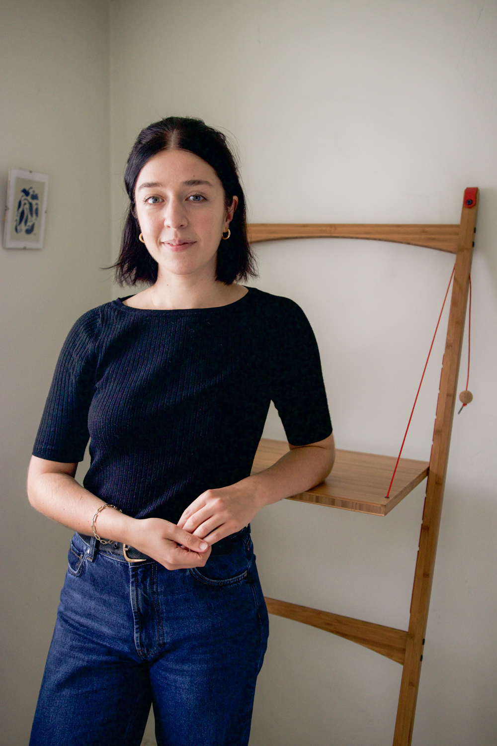 Besma stands next to Leandesk