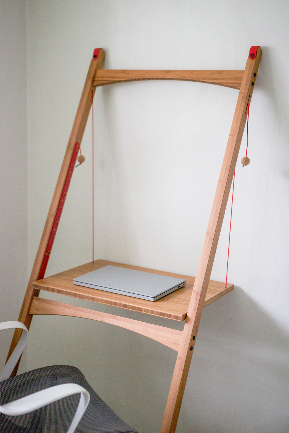 Leandesk next to Herman Miller chair