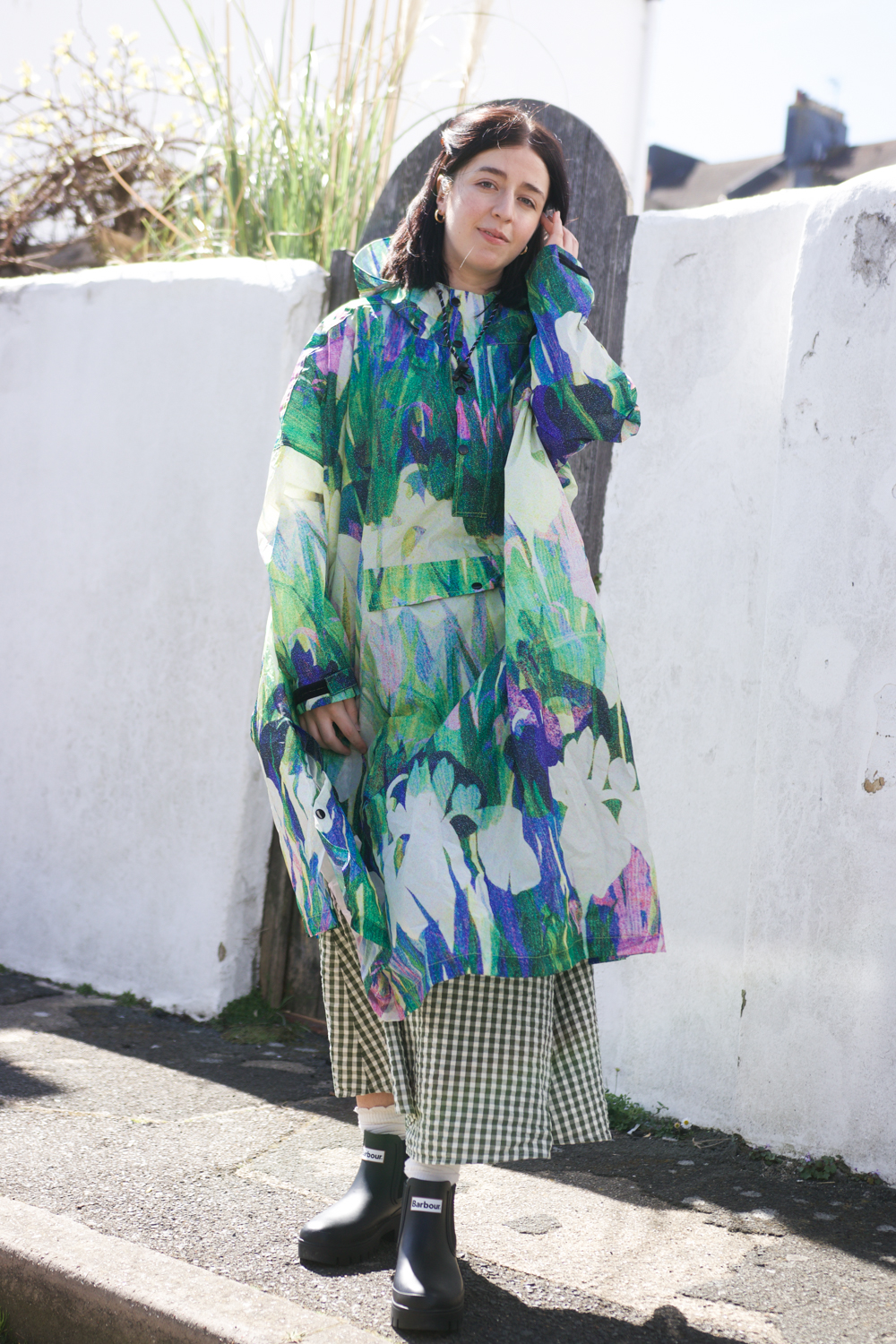 Festival outfit with rain mac and wellies