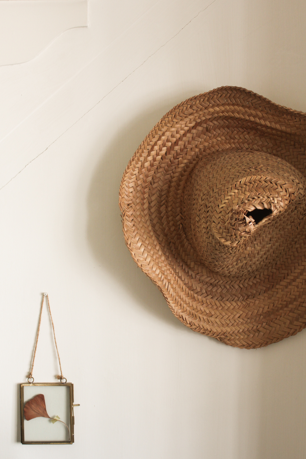 Moroccan woven hat hung on wall