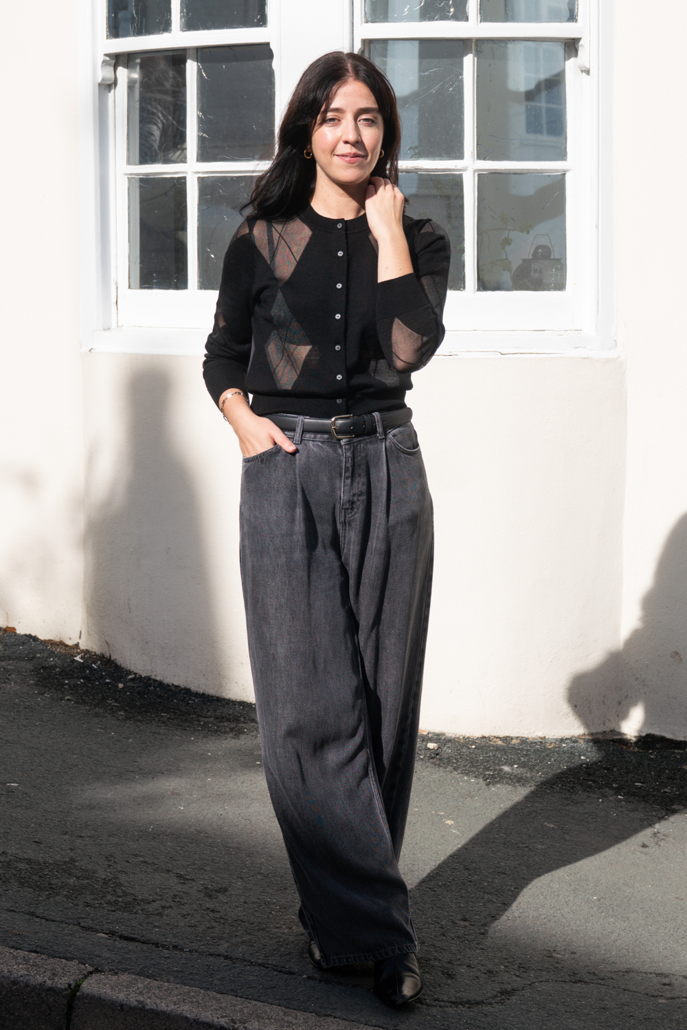 Argyle cardigan with slouchy jeans outfit