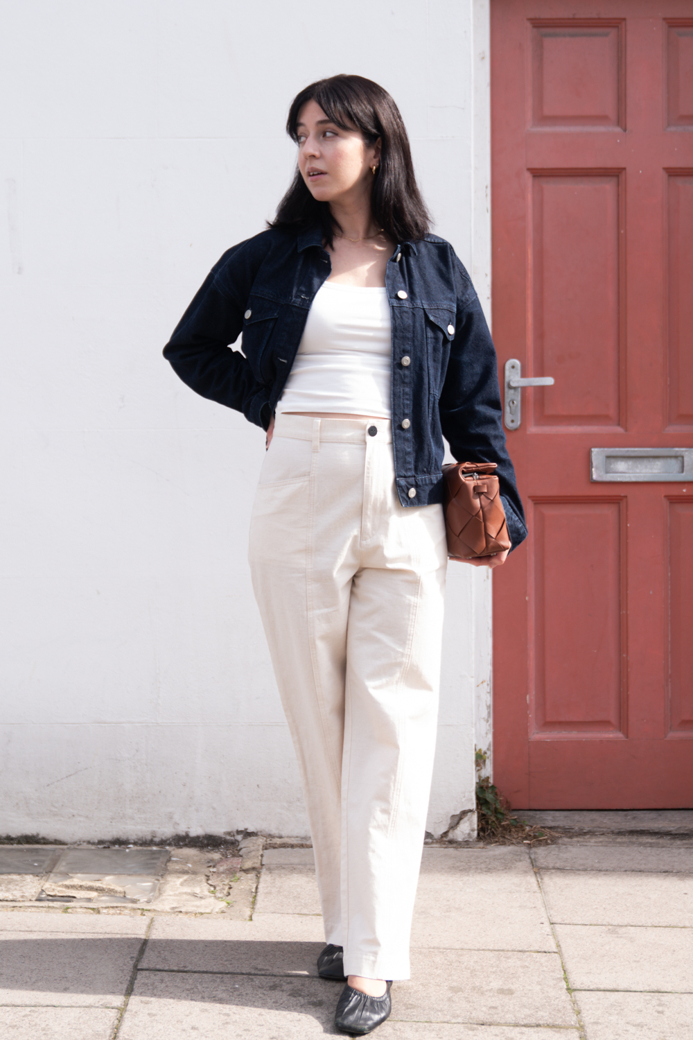 Besma wears cream linen trousers from Tove and Libra